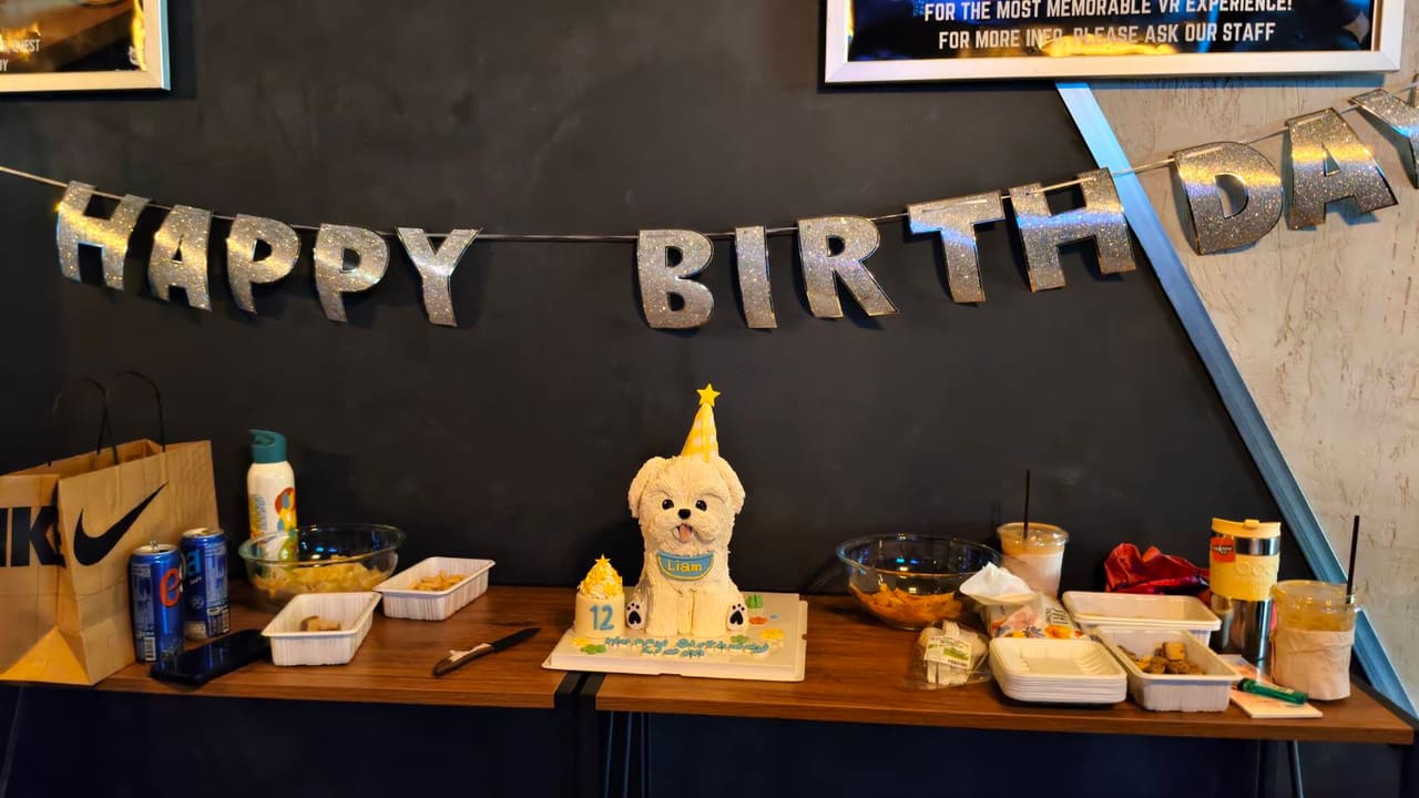 Birthday cake and party snacks set up at Total VR