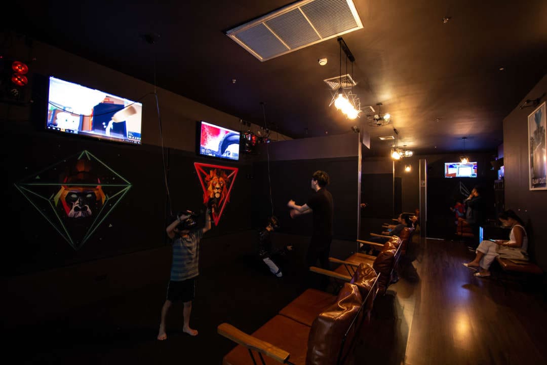 VR gaming stations and spectator seating at Total VR